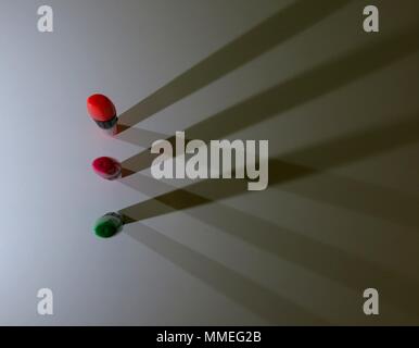 Highlighters casting shadows on white background. Stock Photo