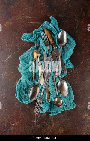 Metal kitchen utensils - forks, spoons of knives Stock Photo