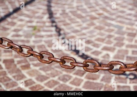 Old rust massive iron chain on sunlight Stock Photo