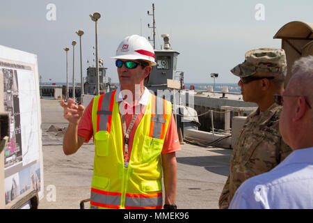 U.S. Army Central is the primary land component command for U.S. Central Command operations. The archival image records an infrastructure briefing with engineers at Kuwait Naval Base focused on training support and facility development. Stock Photo
