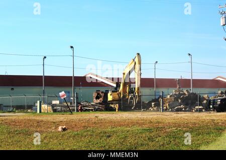 https://l450v.alamy.com/450v/mmem3n/workers-with-contractor-alliance-steel-construction-inc-of-superior-wis-remove-debris-of-an-old-building-oct-20-2017-on-the-cantonment-area-at-fort-mccoy-wis-the-contractor-removed-12-buildings-as-part-of-a-task-order-coordinated-by-the-directorate-of-public-works-us-army-photo-by-scott-t-sturkol-public-affairs-office-fort-mccoy-wis-mmem3n.jpg