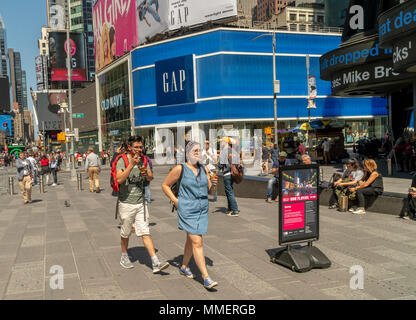 A Gap next to its Old Navy brand store in Times Square in New York on Tuesday, May 1, 2018. (Â© Richard B. Levine) Stock Photo