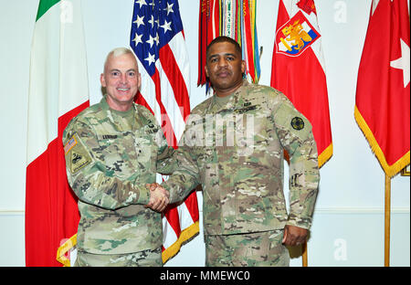 From left, Brig. Gen. Eugene J. LeBoeuf, Commanding General of U.S. Army Africa, and  Brig. Gen. Douglas McBride, Commanding General of 13th Expeditionary Sustainment Command, pose for a photograph in the USARAF commander’s office during a recent visit to Caserma Ederle, Vicenza, Italy Oct. 31, 2017. (U.S. Army photo by Antonio Bedin) Stock Photo