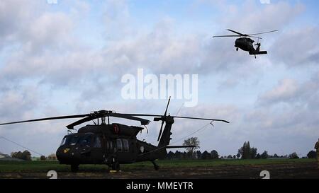 Air Cav is on the move! The first flight has left Chievres Air Base for Illesheim, Germany. Stock Photo