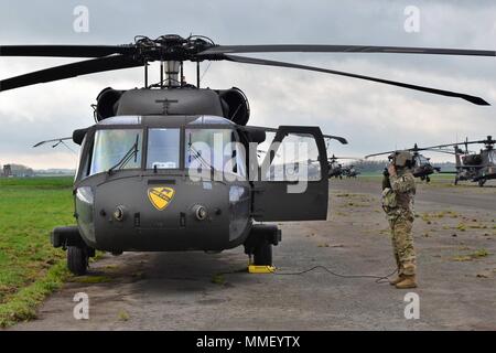 Air Cav is on the move! The first flight has left Chievres Air Base for Illesheim, Germany. Stock Photo