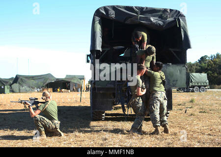 U.S. Marines, 2nd Transportation Support Battalion, Conduct casualty evacuation drills during a training exercise at Camp Lejeune, N.C., Oct. 24, 2017. Marines participated in Bold Alligator 17, an annual training exercise which was designed to allow the Navy and Marine Corps team to train with partner nations to refine and strengthen core amphibious competencies critical to maritime power projection. (U.S. Marine Corps photo by Lance Cpl. Scarlet A. Sharp) Stock Photo