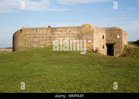Old broken German bunkers of Atlantic Wall and artillery battery of Longues sur Mer Stock Photo