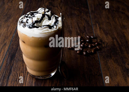 Iced Coffee Chocolate Frappe / Frappuccino with Whipped Cream, Chocolate Syrup. Beverage Concept. Stock Photo