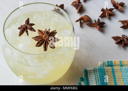 Cardamom Cocktail with Anise Star and Crushed Ice. Beverage Concept. Stock Photo