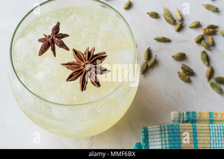 Cardamom Cocktail with Anise Star and Crushed Ice. Beverage Concept. Stock Photo