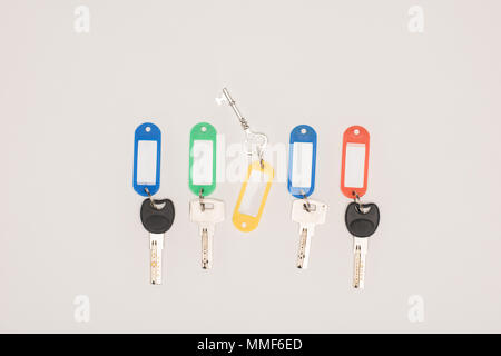 top view set of different keys with colorful labels isolated on white Stock Photo