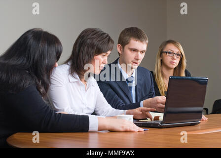 Businessgroup with laptop Stock Photo