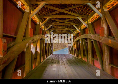 Pennsylvania, USA, APRIL, 18, 2018: Indoor view of details of red covered bridge inside of the forest in Lancaster Stock Photo