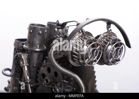 the robot head in style in the steampunk  isolated on white background with detail and on a stand Stock Photo