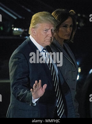 United States President Donald J. Trump waves to the press as he walks to the tarmac to welcome Kim Dong Chul, Kim Hak Song and Tony Kim back to the US at Joint Base Andrews in Maryland on Thursday, May 10, 2018. The three men were imprisoned in North Korea for periods ranging from one and two years. They were released to US Secretary of State Mike Pompeo as a good-will gesture in the lead-up to the talks between President Trump and North Korean leader Kim Jong Un. Credit: Ron Sachs/CNP | usage worldwide Stock Photo