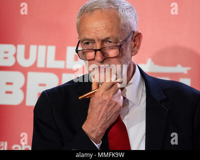 Glasgow, UK. 11 May, 2018. Labour Leader Jeremy Corbyn giving a speech in Govan, Glasgow in which he said that a Labour government will proactively support UK shipbuilding as part of a wider industrial strategy and called on the Conservative Government to guarantee three new Royal Fleet Auxiliary vessels will be built in domestic shipyards. Credit: Iain Masterton/Alamy Live News Stock Photo