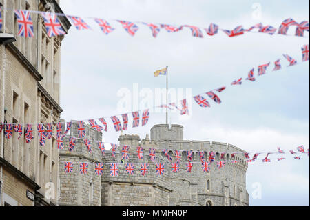 Windsor, UK.  11 May 2018.  Bunting has been hung overhead in Windsor for the wedding between Prince Harry and Meghan Markle on 19 May.  Thousands of people are expected to visit the town for what has been billed as the wedding of the year.  Credit: Stephen Chung / Alamy Live News Stock Photo