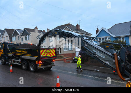 Bristol, UK. 11th May 2018. Workmen seen carrying out overnight resurfacing of the Wells Road A37, outbound Broadfield Road to Airport Road on Friday 11th may .Part of a larger on going scheme. Bristol City Council and North East Somerset Council made a joint bid to the Department of Transport for the Local Highways Maintenance Challenge Fund. Total amount awarded which includes a contribution from each authority is £6.4m Proposed carriageway reconstruction A4 and A4174 Corridors. Robert Timoney/Alamy/Live/News Stock Photo