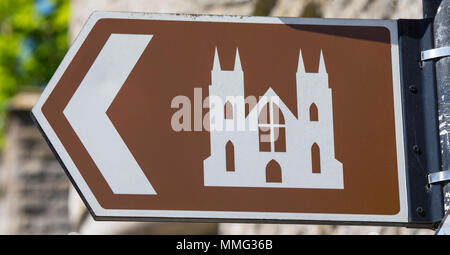 A sign in the historic market town of Arundel, pointing visitors in the direction of Arundel Cathedral in West Sussex, UK. Stock Photo