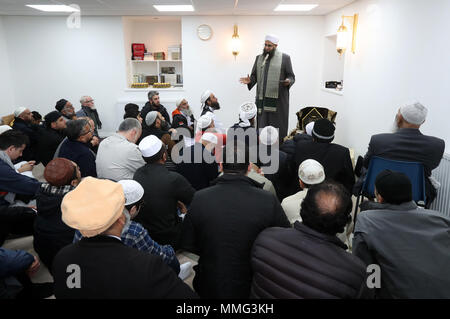 Iman Mufti Abdur Rahman Mangera speaks to members of the Muslim community in Stornoway on the Isle of Lewis as they attend the official opening of the first mosque in the Outer Hebrides. Stock Photo