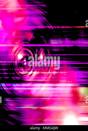 Audio speakers on purple and red streaked background Stock Photo