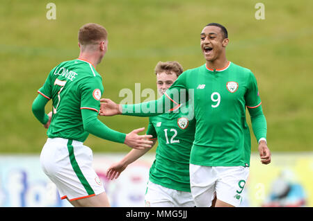 Republic of Ireland's Adam Idah (right) celebrates scoring his side's second goal of the game with teammates Marc Walsh (centre) and Kameron Ledwidge during the UEFA European U17 Championship, Group C match at St George's Park, Burton. Stock Photo