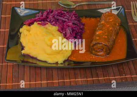 Beef roulade with red cabbage and mashed potatoes Stock Photo