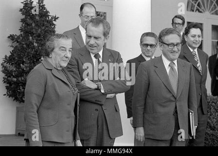 Israeli Prime Minister Golda Meir standing with president Richard Nixon and Henry Kissinger, outside the White House in 1973 Stock Photo