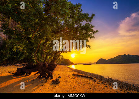Sunset over the beach of Ko Hong island in the Krabi province, Thailand Stock Photo