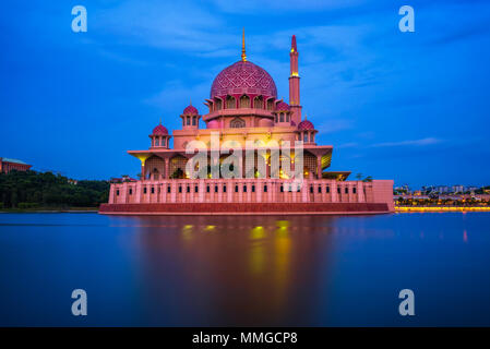 Putra Mosque and Putrajaya Lake in Malaysia at night Stock Photo