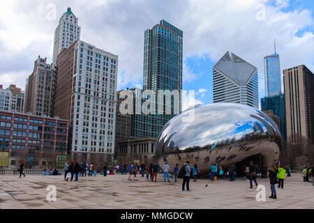 Chicago, Illinois, USA - March 29, 2016: Cloud Gate, a public sculpture by Anish Kapoor at Millennium Park, Nicknamed The Bean because of its shape. Stock Photo