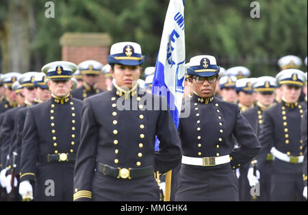 Coast Guard Academy 2/c Kayla Hughely holds the Echo Company flag during the Corps of Cadets Regimental Review, Sept. 22, 2018.     Demonstrating pride in military heritage, Regimental Reviews are one of the oldest cadet traditions.      U.S. Coast Guard Photo by 3/c Andrew Kang Stock Photo