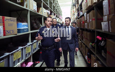 Historical photograph of CBP Commissioner Kevin K. McAleenan: U.S. Customs and Border Protection Acting Commissioner Kevin K. McAleenan tours the vault at the Otay Mesa, Calif., cargo facility which contains over 125,000 kilograms of seized narcotics, October 12, 2017. U.S. Customs and Border Protection photos by Charles Csavossy Stock Photo