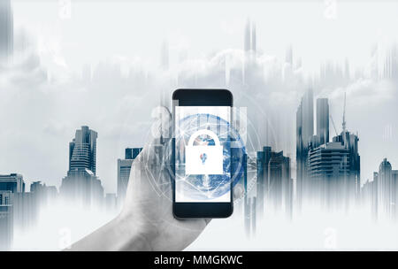 Mobile device security and internet connection . Hand using mobile smart phone and lock icon. Element of this image are furnished by NASA Stock Photo