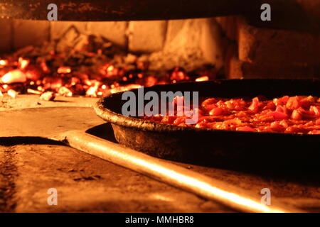 pizza in the wood oven Stock Photo