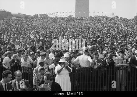 Both black and white Civil Rights March attendees around the Washington Monument Stock Photo