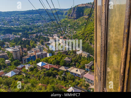 Chiatura is a georgian mining city famous for its socialist architecture, and for the super old and rusty cable cars still used nowadays Stock Photo