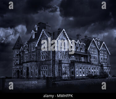 This image is a photo manipulation of a block of apartments that is in good repair and made to look as though it's derelict, run down and haunted. Stock Photo