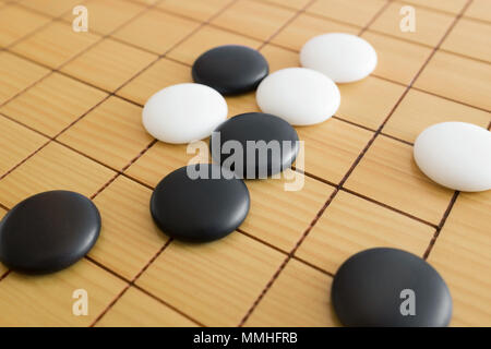 Go game or Weiqi (Chinese board game) background Stock Photo