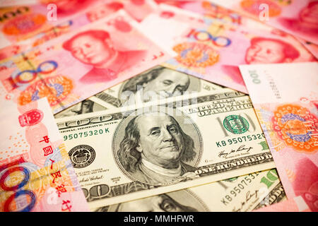 Chinese Yuan Note and U.S. dollar background  (Exchange rate concept) Stock Photo