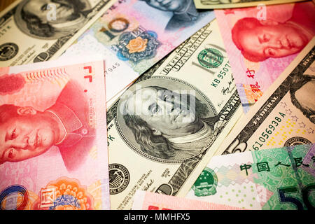 Chinese Yuan Note and U.S. dollar background  (Exchange rate concept) Stock Photo