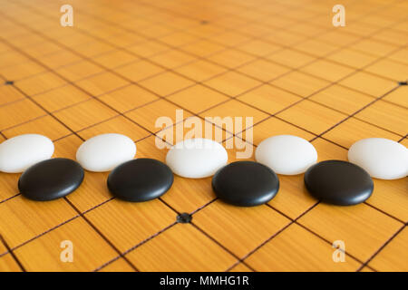 Go game or Weiqi (Chinese board game) background Stock Photo