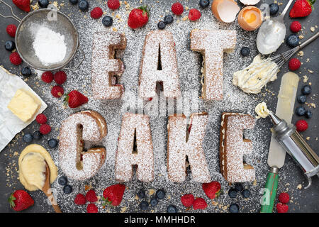 Victoria sponge cakes spelling the word EAT CAKE with ingredients from above. Pattern Stock Photo