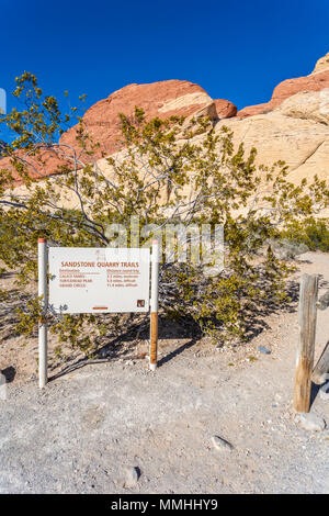 Sign describes Sandstone Quarry Trail in the Red Rock Canyon National Conservation Area outside of Las Vegas, Nevada Stock Photo