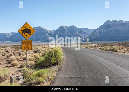 Tortoise crossing sign along road through the foothills of the Red Rock Canyon National Conservation Area outside of Las Vegas, Nevada Stock Photo