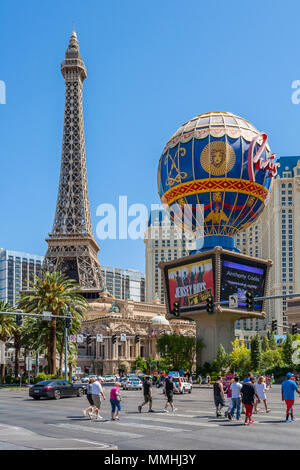 Nightlife Along The Las Vegas Strip In Front Of The Paris Casino Picture  Shows Th Paris Balloon And The Eiffel Tower Replica Which Is About Half The  Size Of The Original In