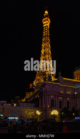 Scale replica of the Eiffel Tower at Paris Las Vegas Hotel and Casino lit up at night on the Las Vegas Strip in Paradise, Nevada Stock Photo