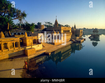 Jaisalmer, India; Gadi Sagar Tank with Krishna temples at dawn Stock Photo