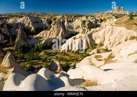 Cappadocia, Turkey; Uchisar valley. After the eruption of Mount Erciyes in 253 BC, the lava formed soft rocks in the Cappadocia Region. This was erode Stock Photo