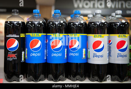 Large Bottles Of Pepsi On Sale On A Shelf In A Supermarket Store In The 